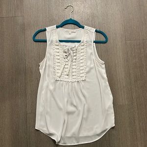 White sleeveless blouse